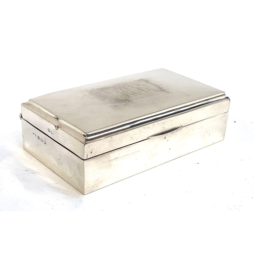 74 - A silver cigarette box, Birmingham 1922, 16cm wide