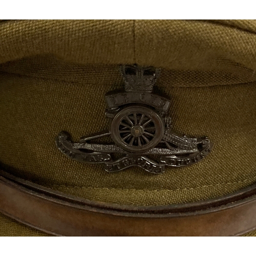 395 - Royal Artillery interest: a number of caps and berets; together with a Moss Bros grey top hat