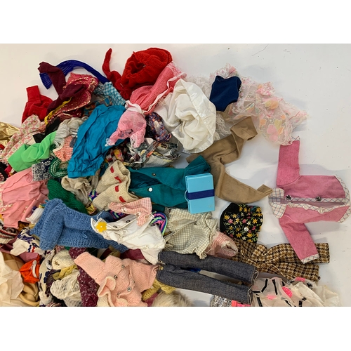 409 - A large quantity of vintage dolls clothes and accessories, possibly, Sindy, Barbie, Pippa or Mary Qu... 