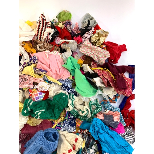 409 - A large quantity of vintage dolls clothes and accessories, possibly, Sindy, Barbie, Pippa or Mary Qu... 