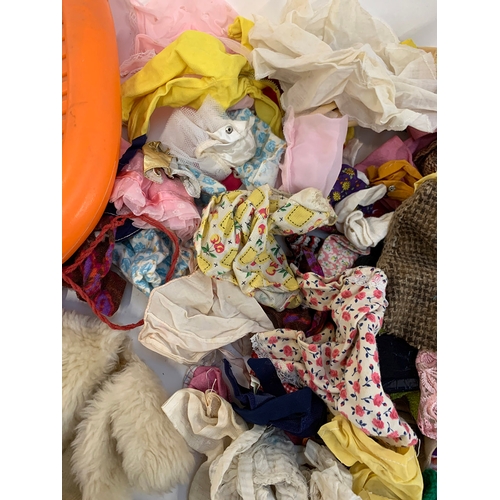 409 - A large quantity of vintage dolls clothes and accessories, possibly, Sindy, Barbie, Pippa or Mary Qu... 