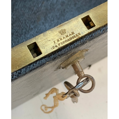 425 - A Victorian leather safety box, embossed 'Donald Robertson', with Bramah lock fitting and key, 38.5c... 