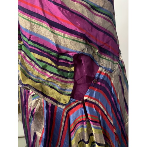 815 - A 1930s multicoloured satin and lame sleeveless dress with waist sash