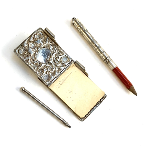 80 - An Edwardian silver plated notebook and pencil; together with a hallmarked silver pencil holder