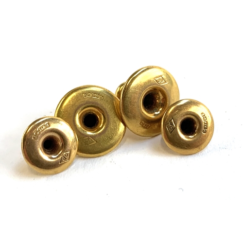 23 - Four 9ct gold shirt studs, gross weight 2.7g