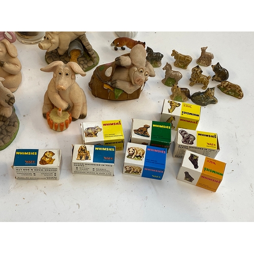 217 - A mixed lot to include Piggin figures, boxed and unboxed Wade figurines, Royal Doulton etc