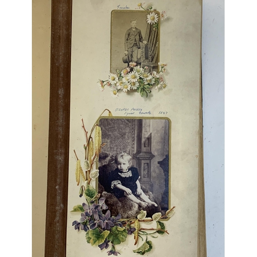 534 - A Victorian photograph album containing a quantity of black and white photographs, late nineteenth a... 