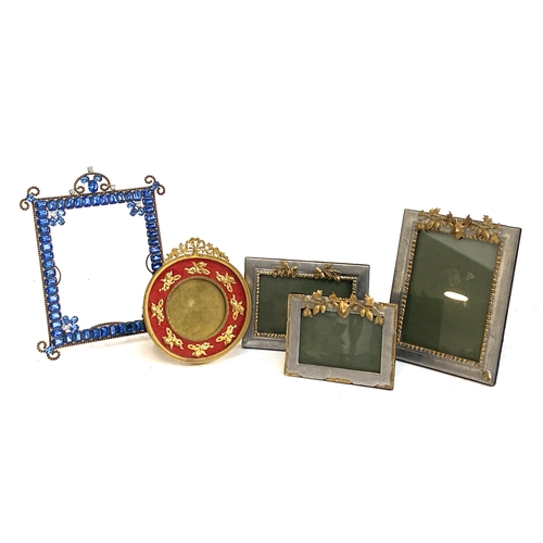 538 - A set of three gilt metal mounted silver plated photo frames, depicting stags and acorns; together w... 