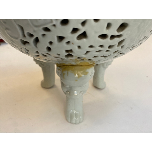 262 - A Chinese blanc de chine porcelain censer (af), of pierced form, the lid surmounted by a foo dog, 38... 