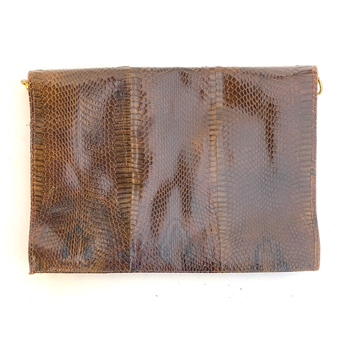 584 - A snakeskin wallet, 36x26cm