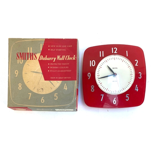 596 - A Smiths Dubarry red electric wall clock, in original box