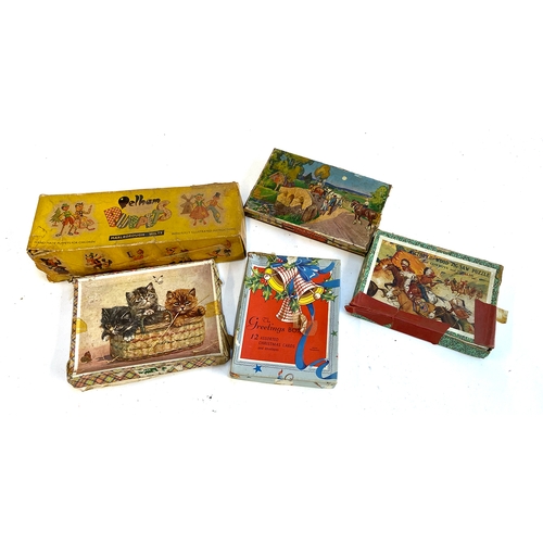 605 - A small lot to include Pelham Puppet, boxed, Victory puzzles, Huntley & Palmers tin, etc