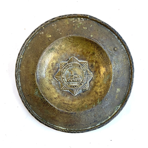 626 - A brass regimental plate, Lincolnshire Regiment, Egypt, with Sphinx to centre, 26cmD