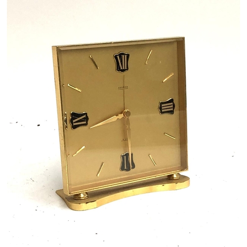 680 - A Swiss mid-century brass mantle clock. Loofing 15 jewel lever 8-day antimagnetic. Serial number 625... 