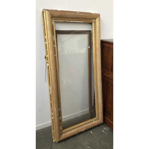 1549 - A large gilt gesso picture frame, 165x84cm, internal 140x59cm