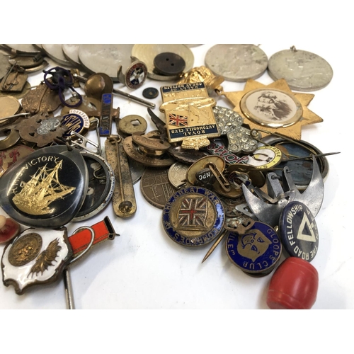 423 - A mixed lot to include WWII Defence Medal, War Medal, George VI coronation medals, George V silver j... 