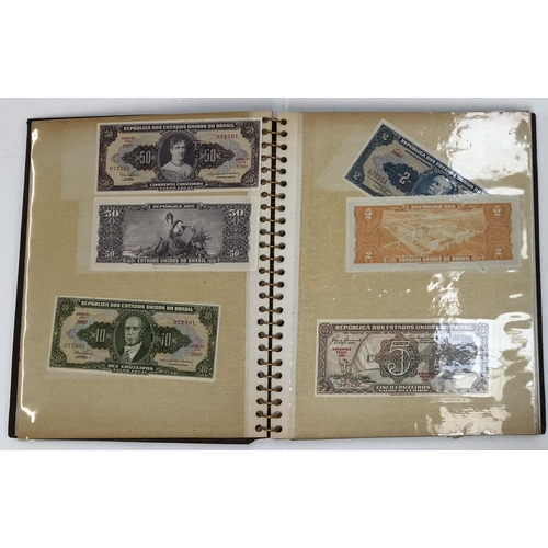 132 - An album containing a quantity of world banknotes to include France, Brazil, Portugal, Spain, etc