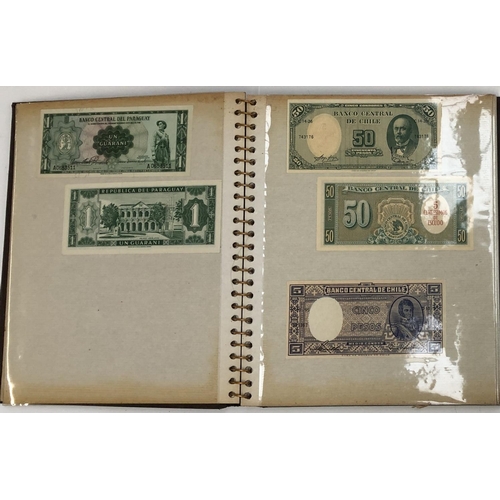 132 - An album containing a quantity of world banknotes to include France, Brazil, Portugal, Spain, etc