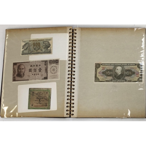 132 - An album containing a quantity of world banknotes to include France, Brazil, Portugal, Spain, etc