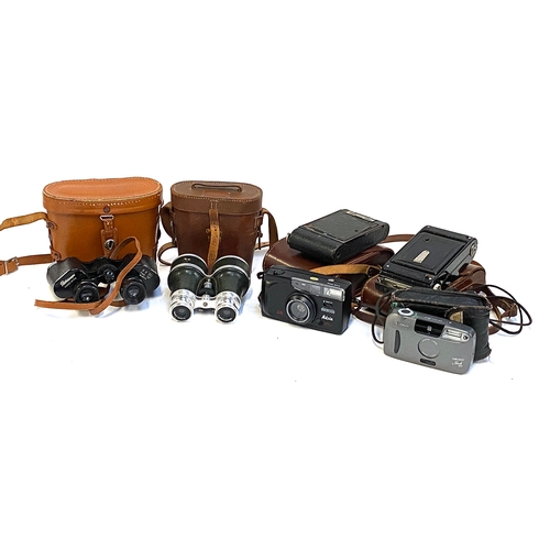 561 - A mixed lot to include Binoculars by Gregory & Seeley 51 Strand, Pathescope 8x13 binoculars, a Coron... 