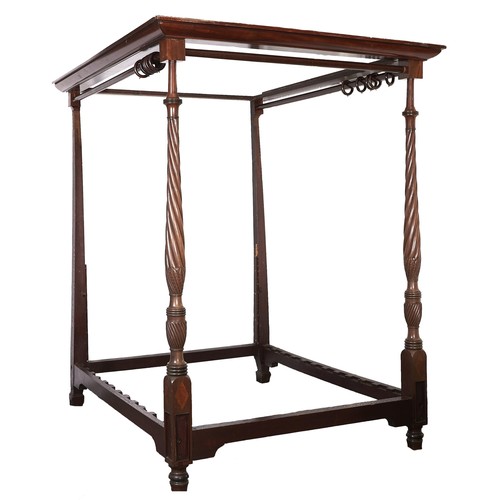 1536 - A George IV oak four-poster bedstead, attributed to Gillows, with stepped moulded mahogany cornice a... 