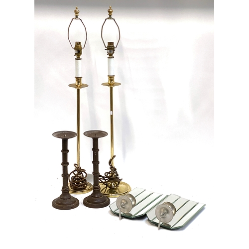 511 - A pair of mirrored wall sconces; a pair of metal pricket candle sticks; and a pair of gilt metal tab... 