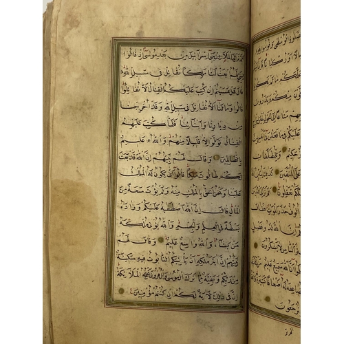 307 - A 19th century Ottoman Quran, within a Russian binding, the pages approx. 18cm high