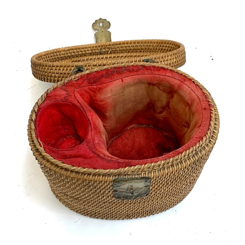 670 - A late 19th/early 20th century Chinese rattan teapot basket lined in red velvet (original famille ro... 