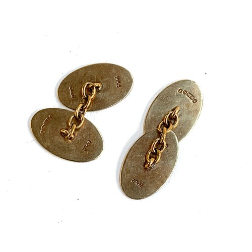 22 - A pair of 9ct gold cufflinks with engine turned design, gross weight 6.3g