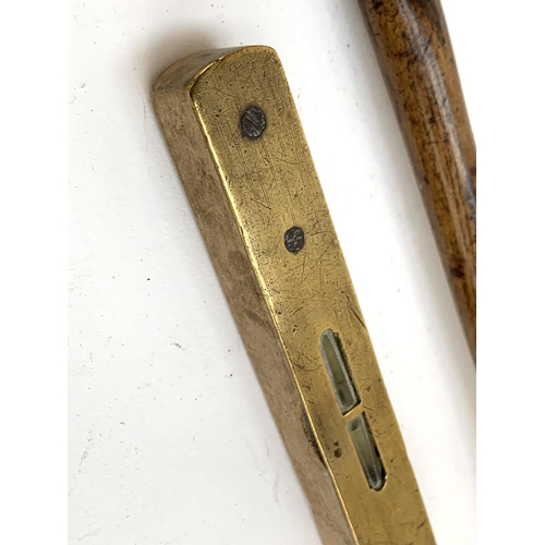 324 - A small antique brass and wood spirit level, 15.5cmL; together with a small claw hammer with turned ... 