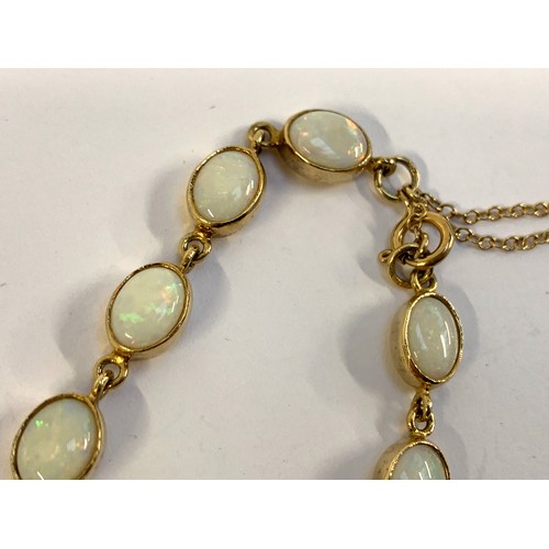 44 - A 9ct gold and opal bracelet, the opals each approx. 7.5cmL, gross weight 8.3g