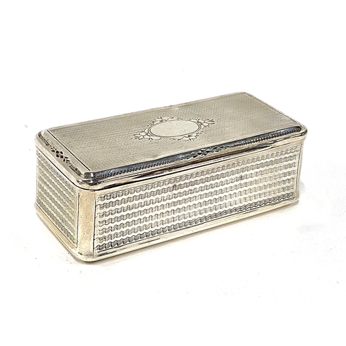 90 - A Continental engine turned silver snuff box, the lid with vacant cartouche, 9.5cm wide, 3.3ozt