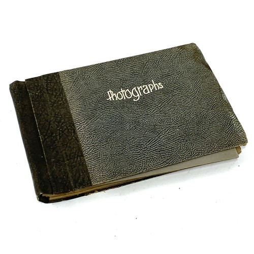 544 - An early 20th century photograph album containing approx. 77 black and white photos of various Engli... 