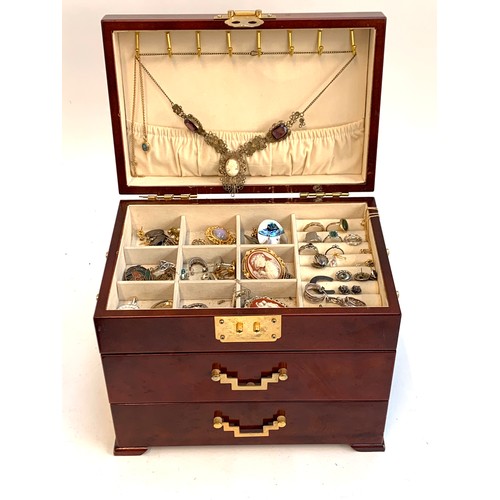 41 - A jewellery box containing a quantity of costume and silvery jewellery, including a Czech Gurtler st... 