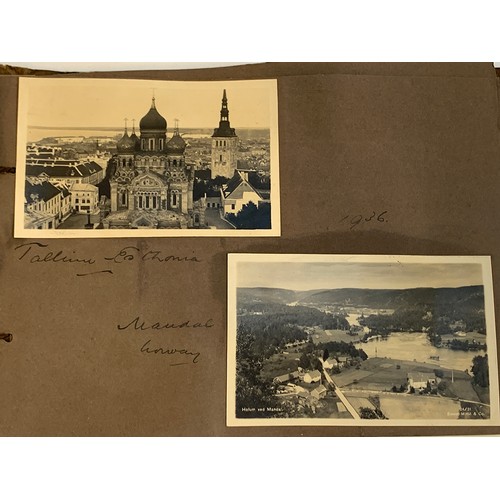 557 - An early 20th century photograph album c.1920 containing approx. 150 black and white photographs, po... 