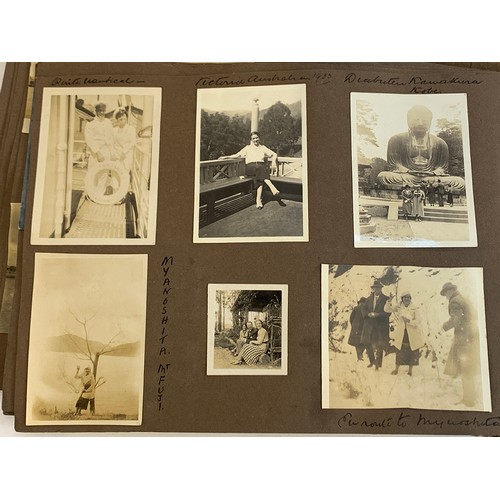 557 - An early 20th century photograph album c.1920 containing approx. 150 black and white photographs, po... 