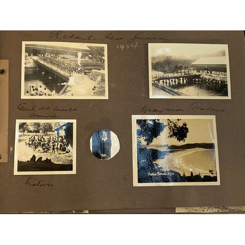 557 - An early 20th century photograph album c.1920 containing approx. 150 black and white photographs, po... 