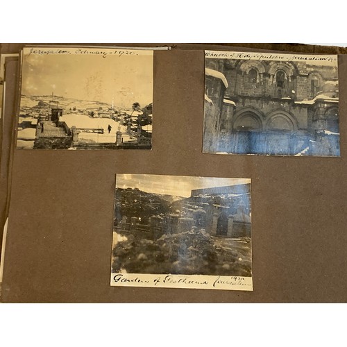 557 - An early 20th century photograph album c.1920 containing approx. 150 black and white photographs, po... 