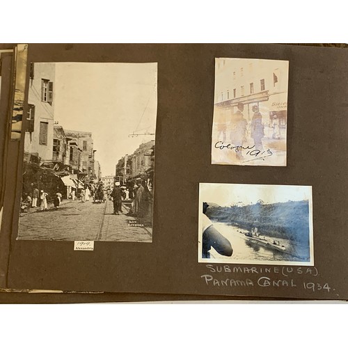 557 - An early 20th century photograph album c.1920 containing approx. 150 black and white photographs, po... 