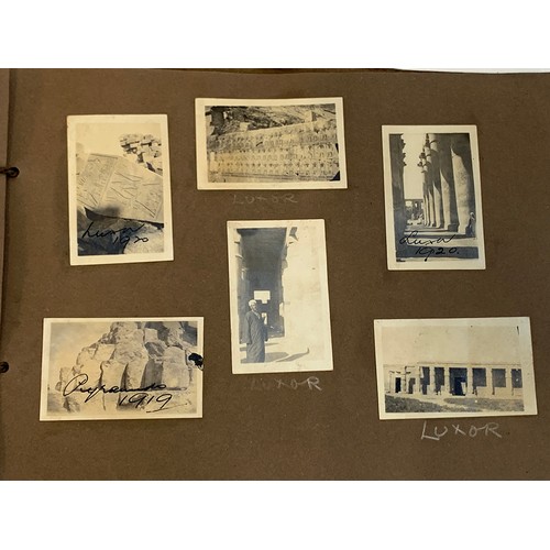 557 - An early 20th century photograph album c.1920 containing approx. 150 black and white photographs, po... 