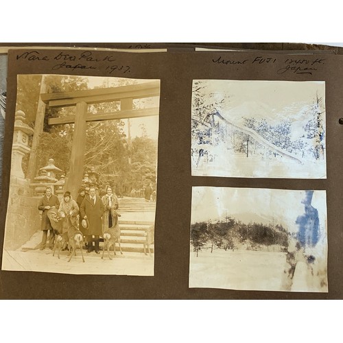 557 - An early 20th century photograph album c.1920 containing approx. 150 black and white photographs, po... 