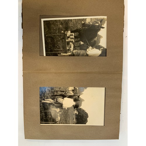 570 - A small photograph album containing 20 photographs. c.1930, mainly equestrian interest, to include B... 