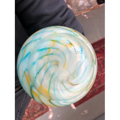 260 - A Mdina style glass swirl pattern vase, 29cmH; together with a Goofus reverse painted carnival glass... 