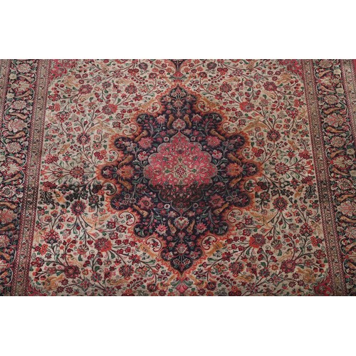 744 - A Tabriz carpet, approx. 302x198cm