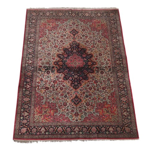 744 - A Tabriz carpet, approx. 302x198cm