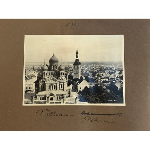 187 - An early 20th century photograph album c.1920 containing approx. 150 black and white photographs, po... 