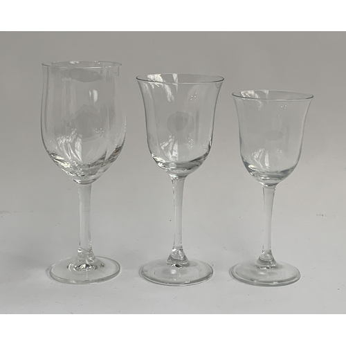 111 - A set of wine glasses with flared rims, the taller 19cmH (1), the smaller 18cmH (8), together with a... 