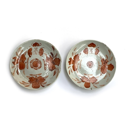 116 - Two Chinese late 19th/early 20th century iron red and white porcelain plates (af), 13cmD