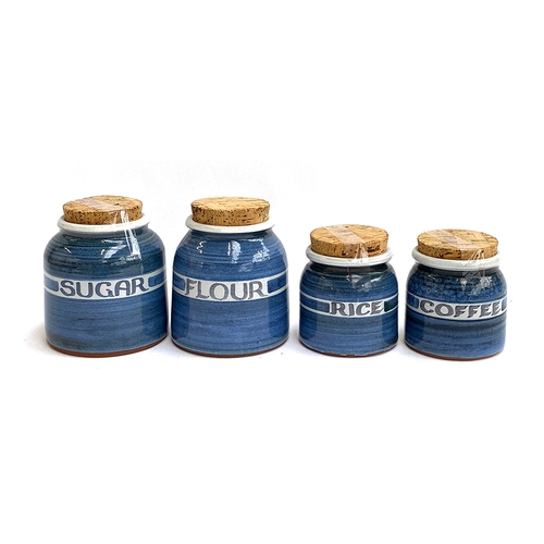 119 - A set of four studio pottery storage jars comprising flour, coffee, sugar and rice, 15cmH to 11cmH