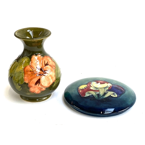 149 - A green Moorcroft vase, 13cmH; together with a Moorcroft lid depicting toadstools, 14cmD (2)